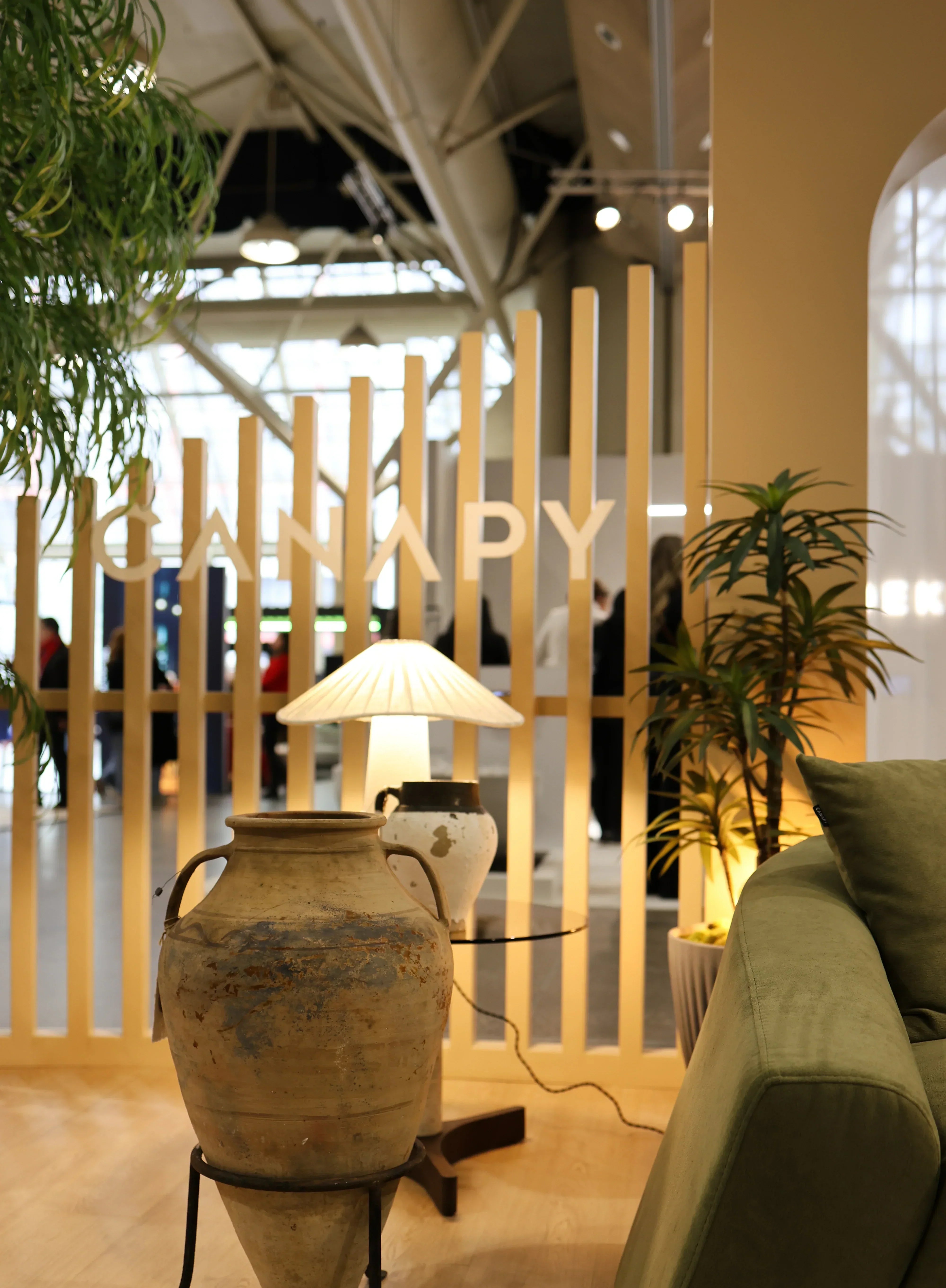 IDS Canapy Furniture booth display with modern seating