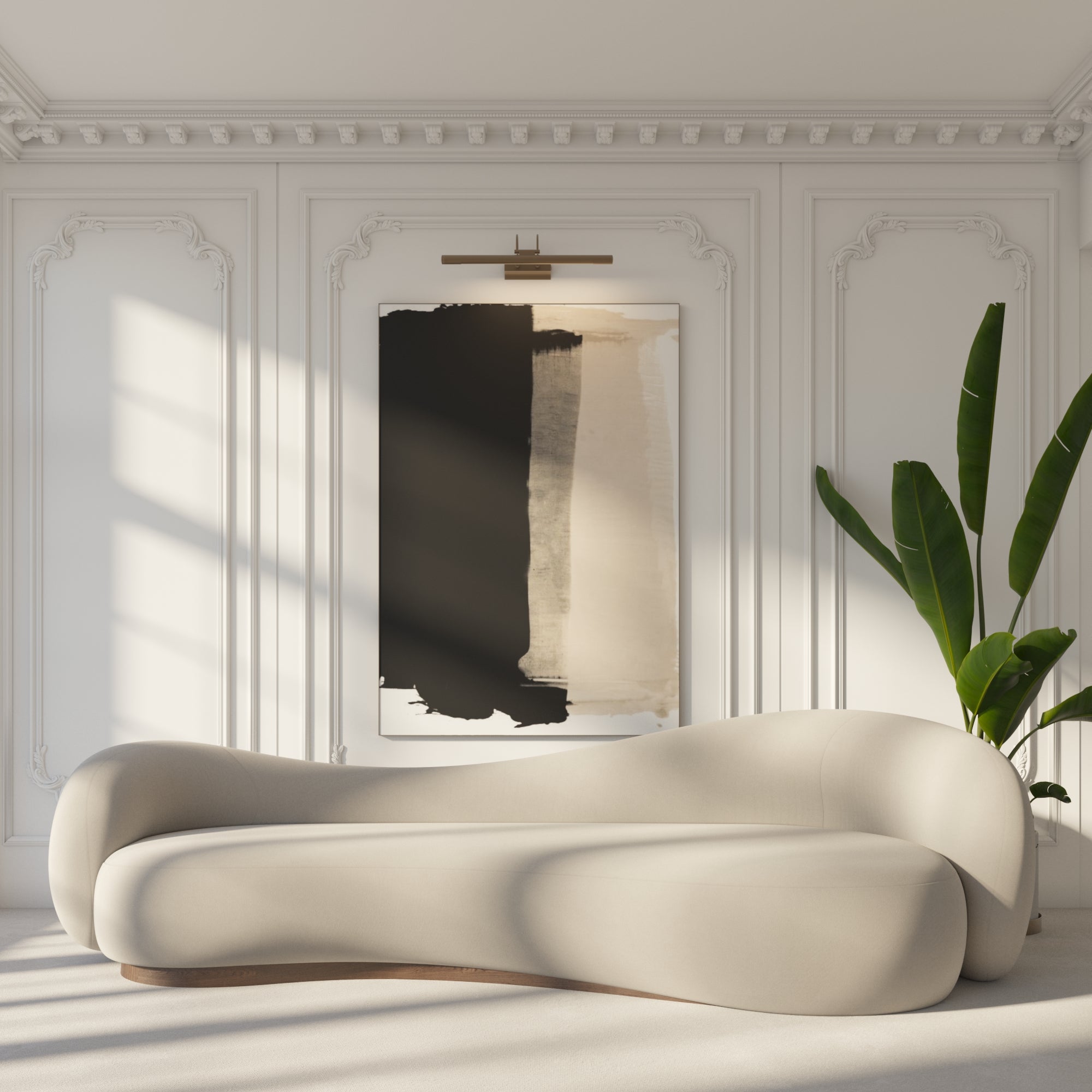 Modern beige sofa in a stylish room with abstract art and a plant