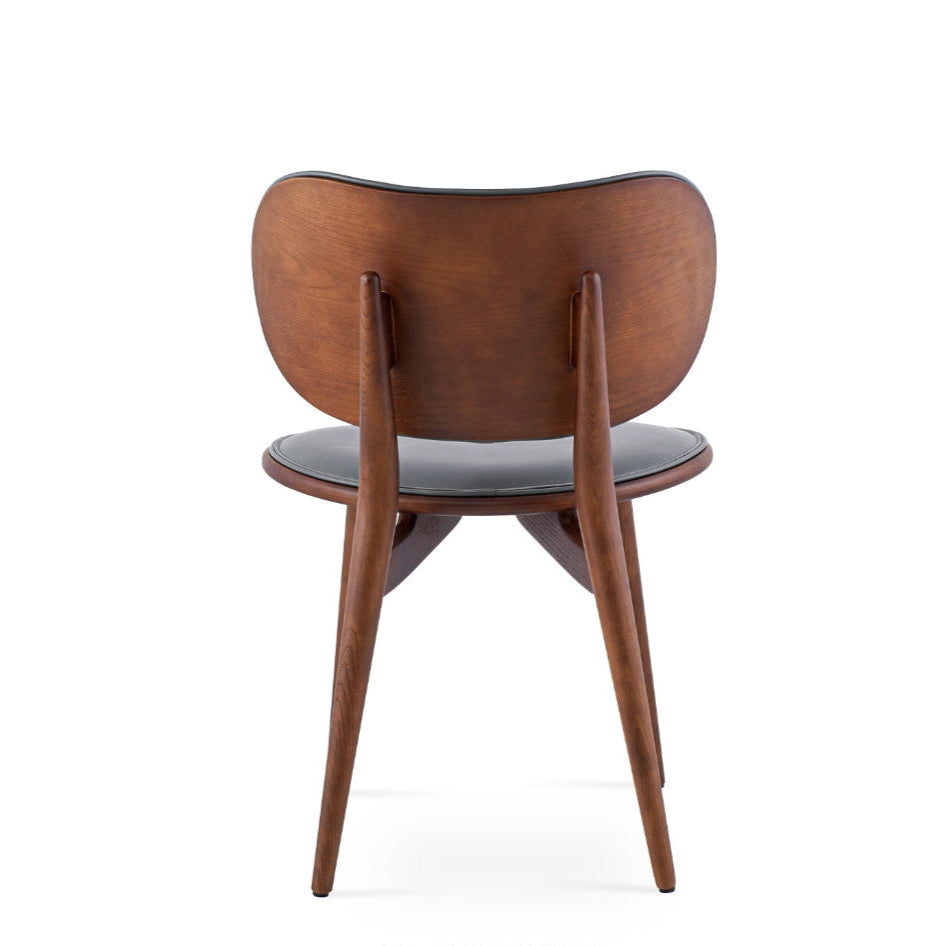 Elevate every meal with a chair that blends bold design and lasting durability—crafted for those redefining their dining space.