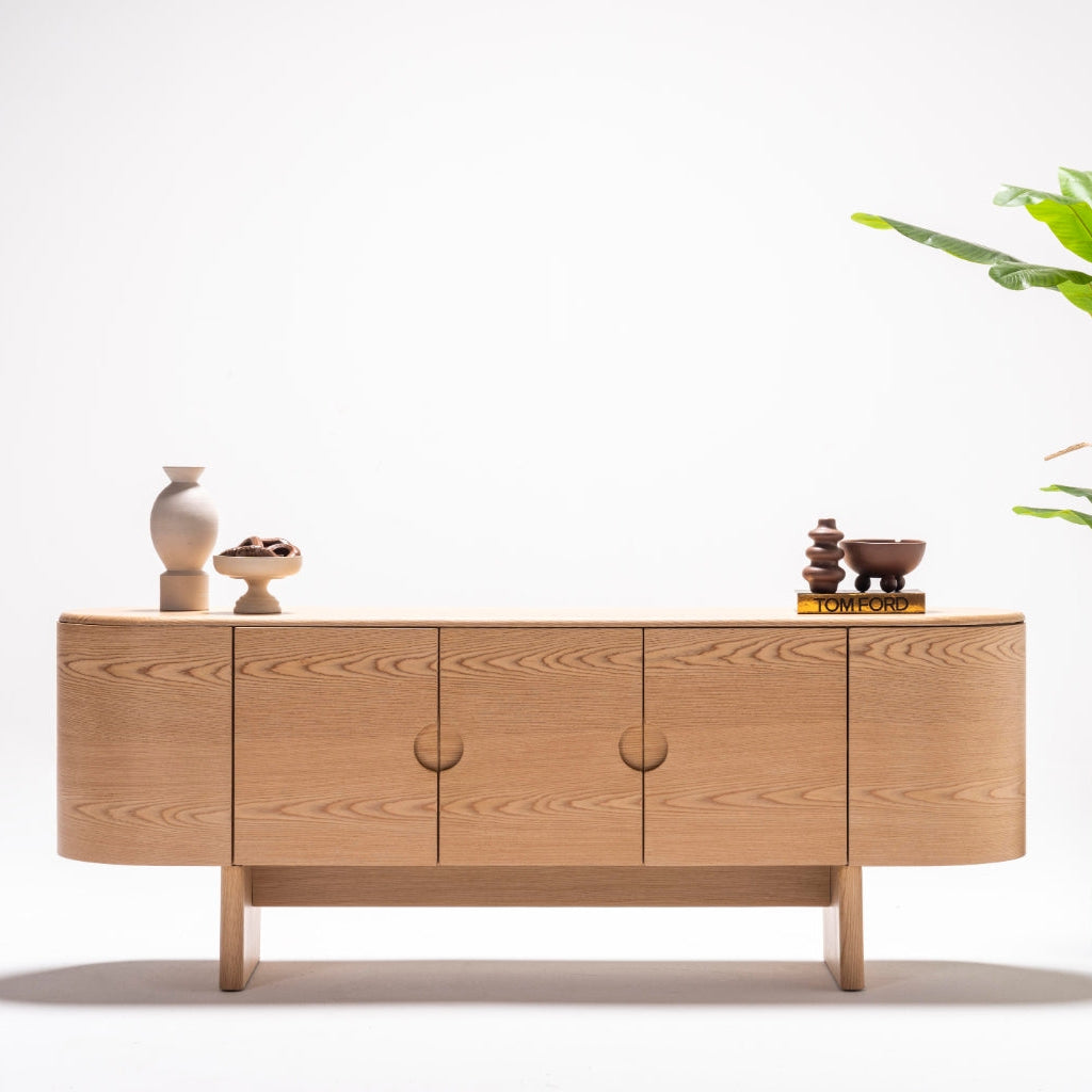Front view of the Alva Console showcasing a sleek minimalist design and spacious storage options.