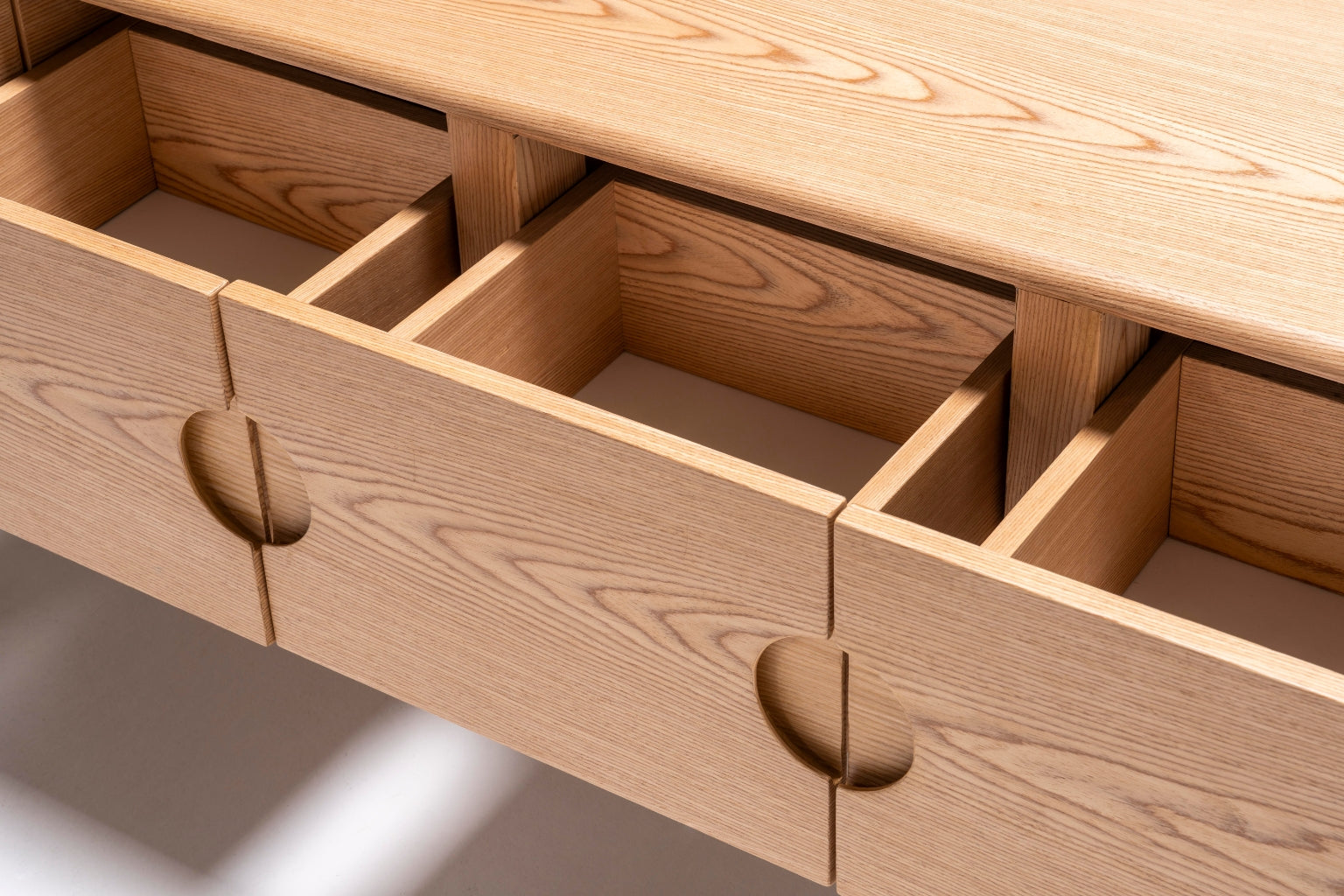 Alva Console available in various finishes to complement different interior styles.