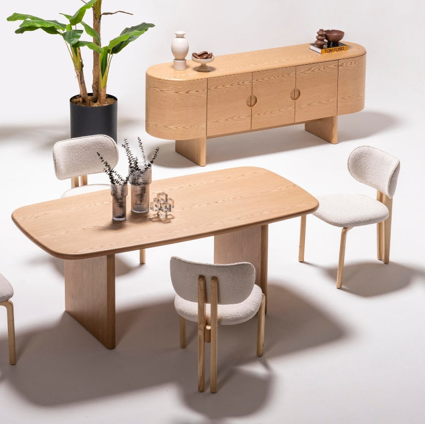 Front view of the Alva Dining Table showcasing its modern design and elegant wood finish.