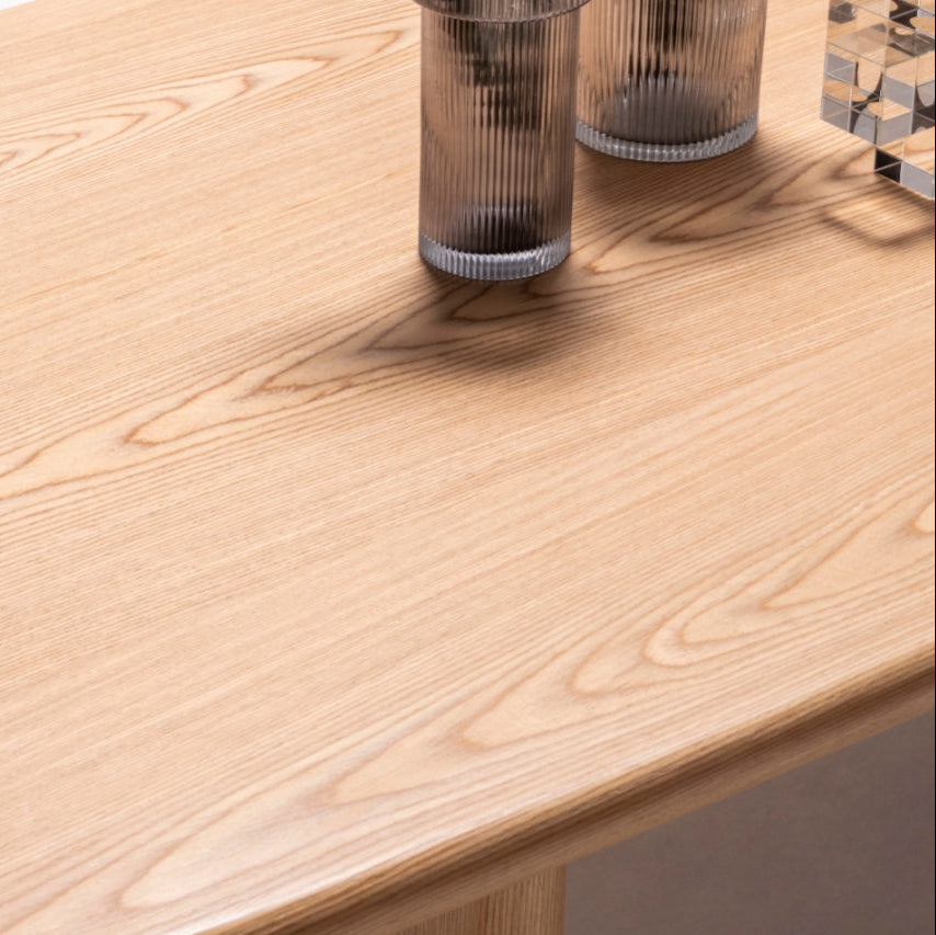 Side view of the Alva Dining Table showcasing its sleek lines and sturdy design.