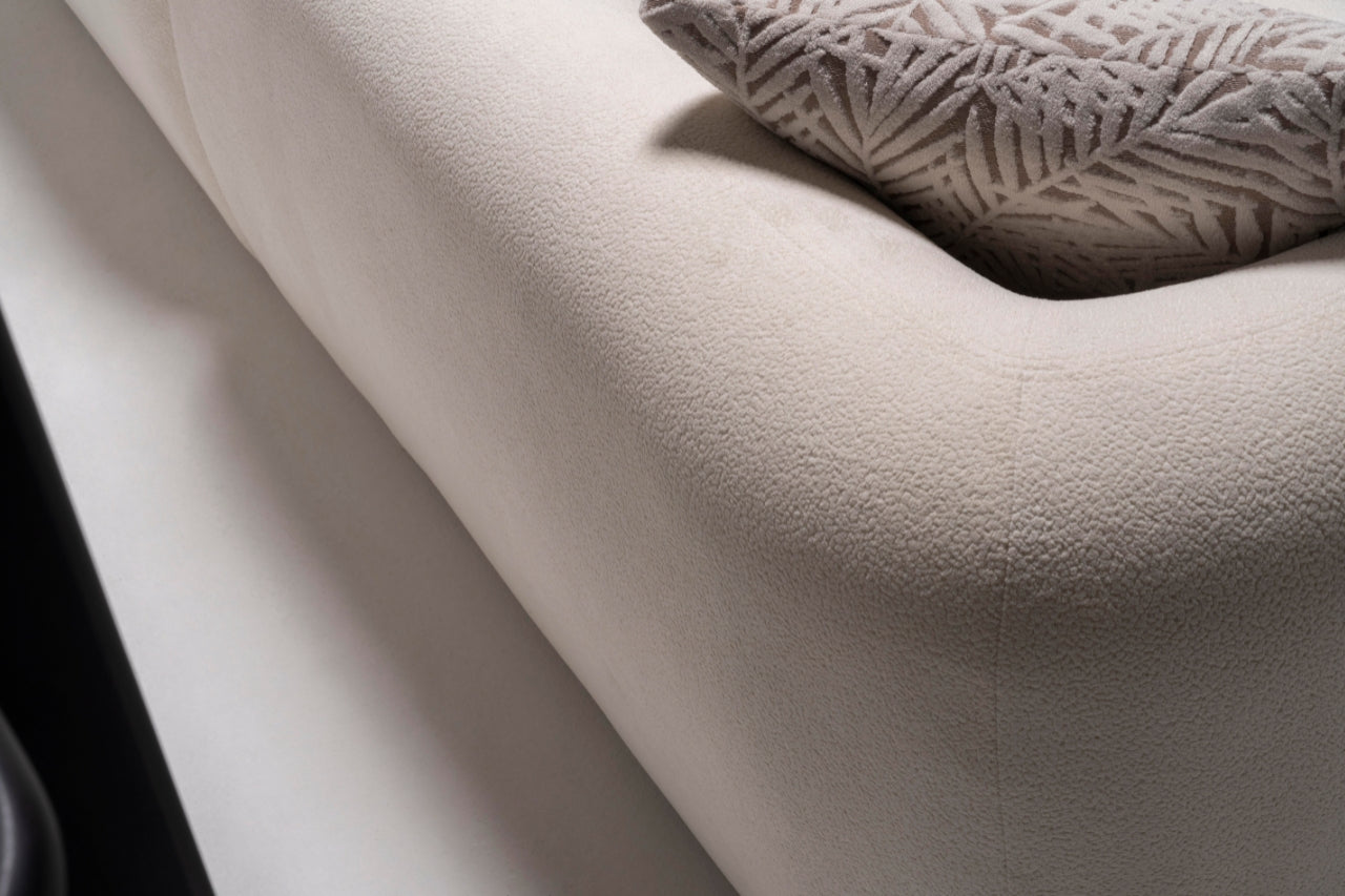 Close-up of the Alva Sofa cushions, showcasing luxurious fabric and cozy comfort.