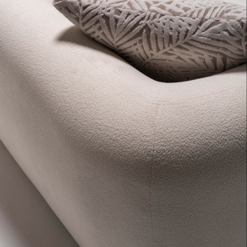 Close-up of the Alva Sofa cushions, showcasing luxurious fabric and cozy comfort.