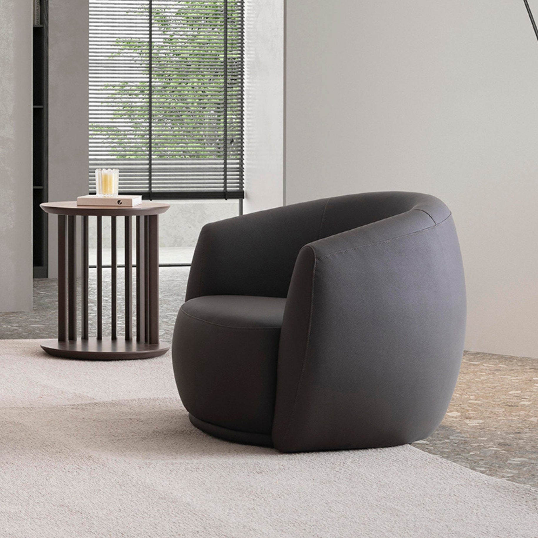 Classico Leatherette Armchair styled in a modern living room with minimalist decor and a floor lamp.