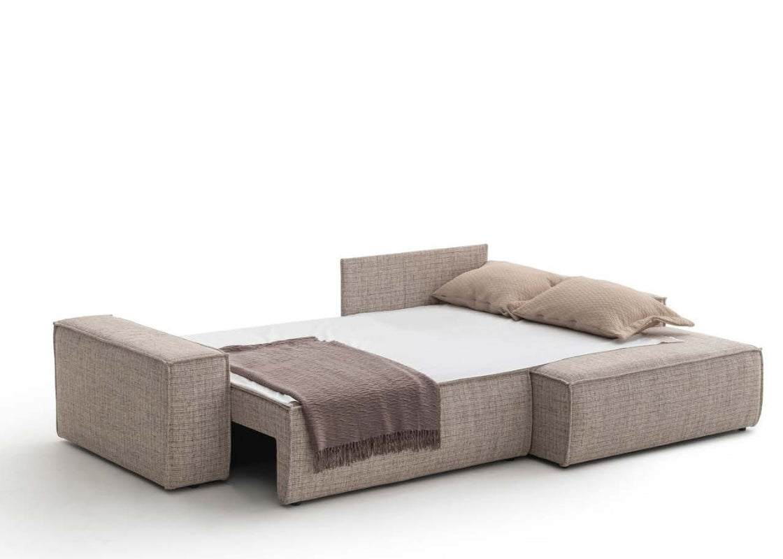 Side angle of the Comfort Loft Sofa Bed highlighting its soft fabric upholstery and sturdy frame.
