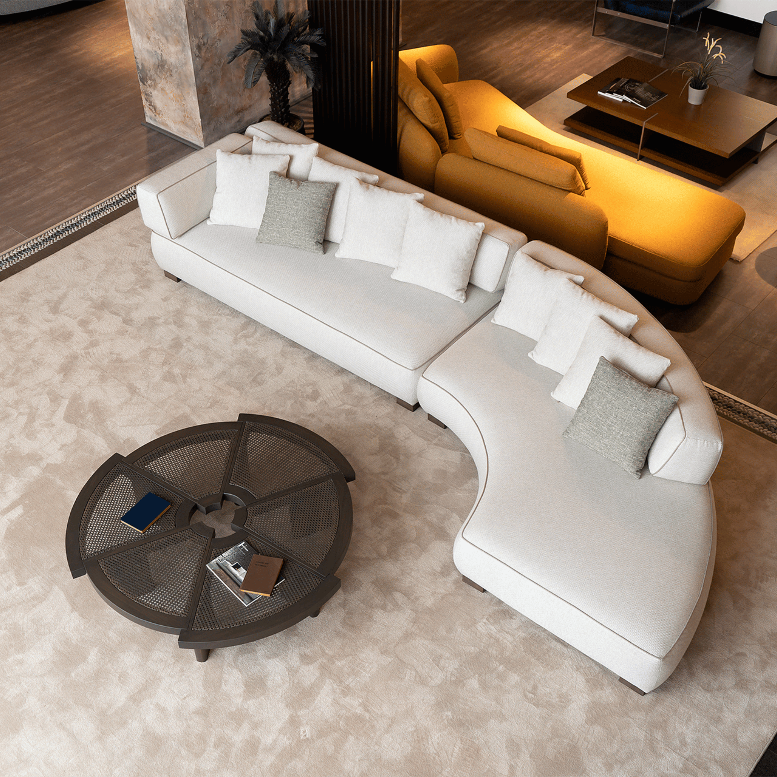 Curved Modular Sofa styled with decorative pillows, adding a cozy and elegant touch.