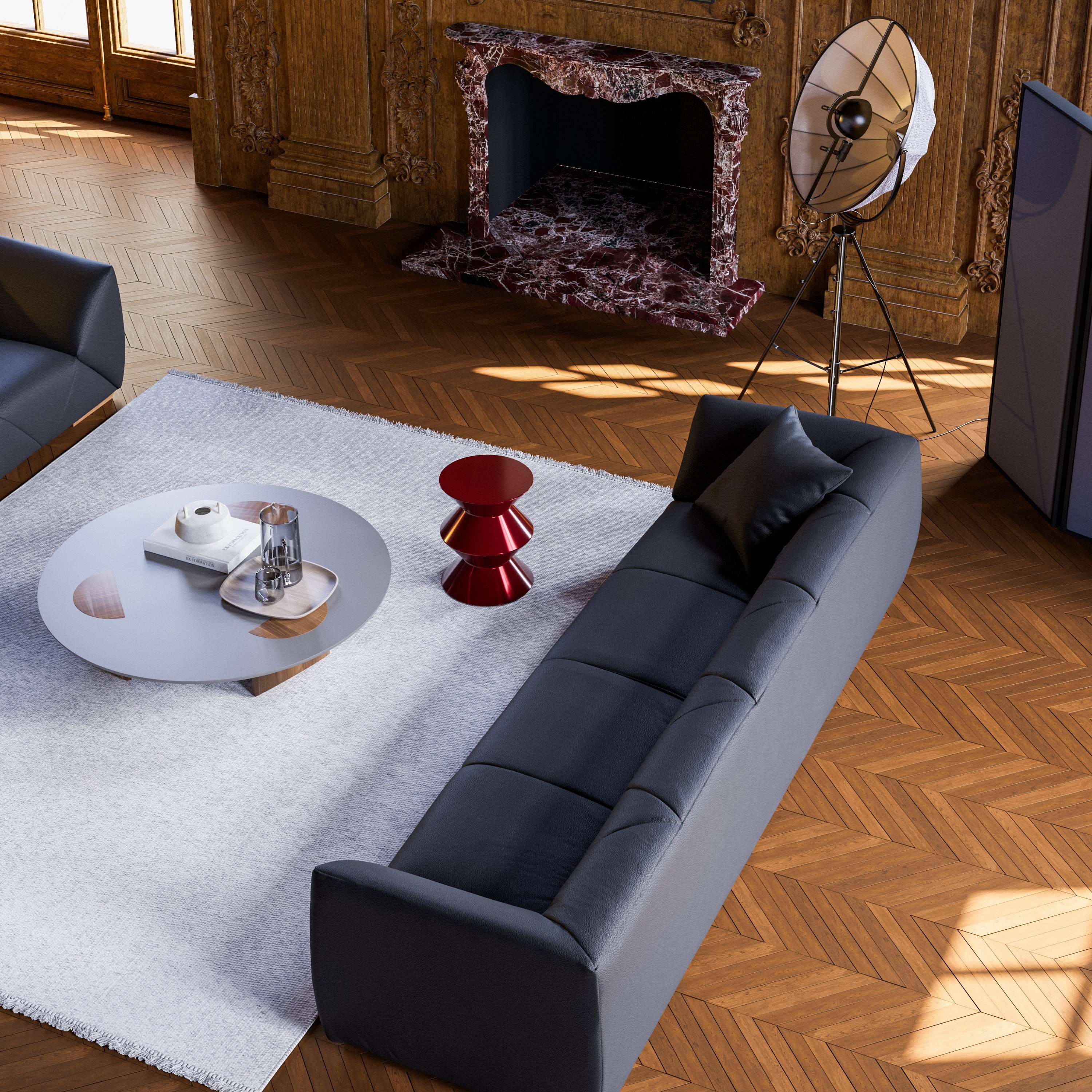 Modern living room with a gray sofa, coffee table, and decorative items.