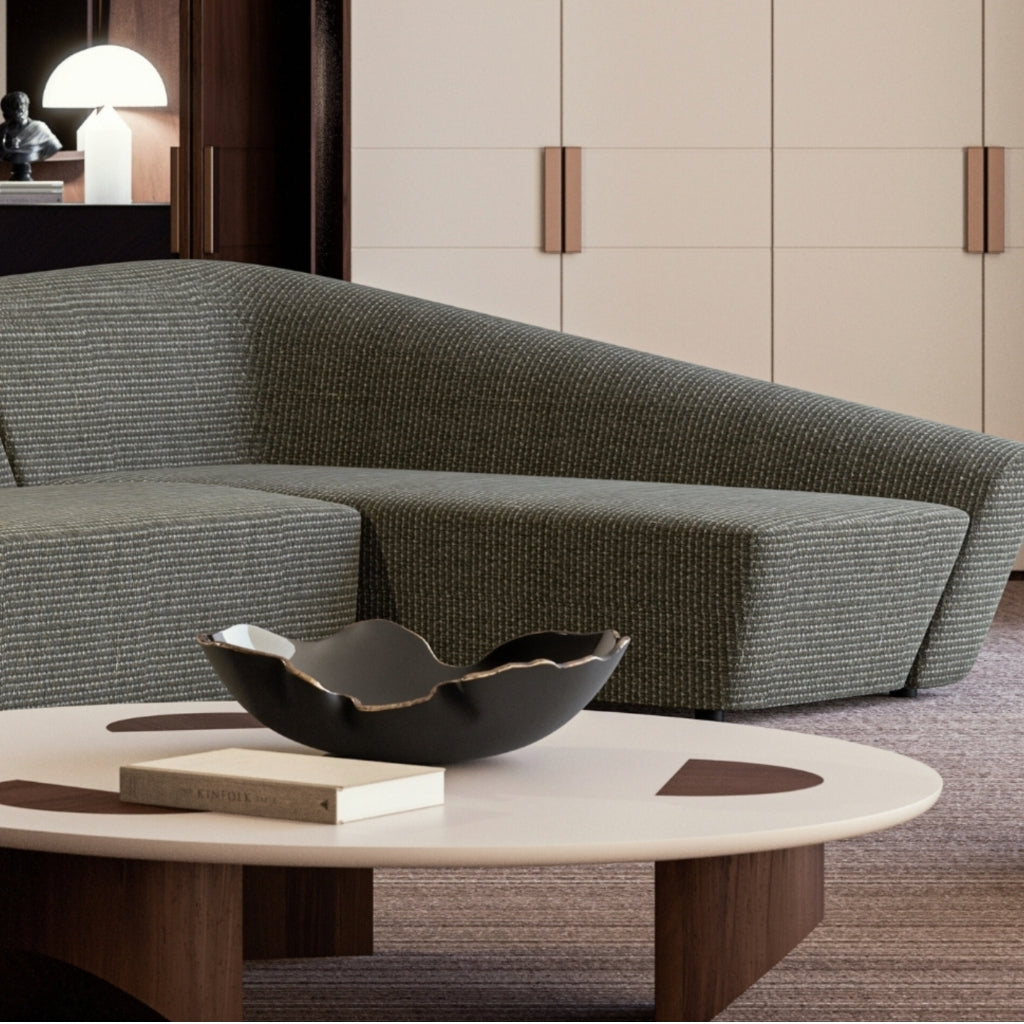 Side angle of the Edge Lounge Modular Sofa showcasing sleek lines and contemporary style.
