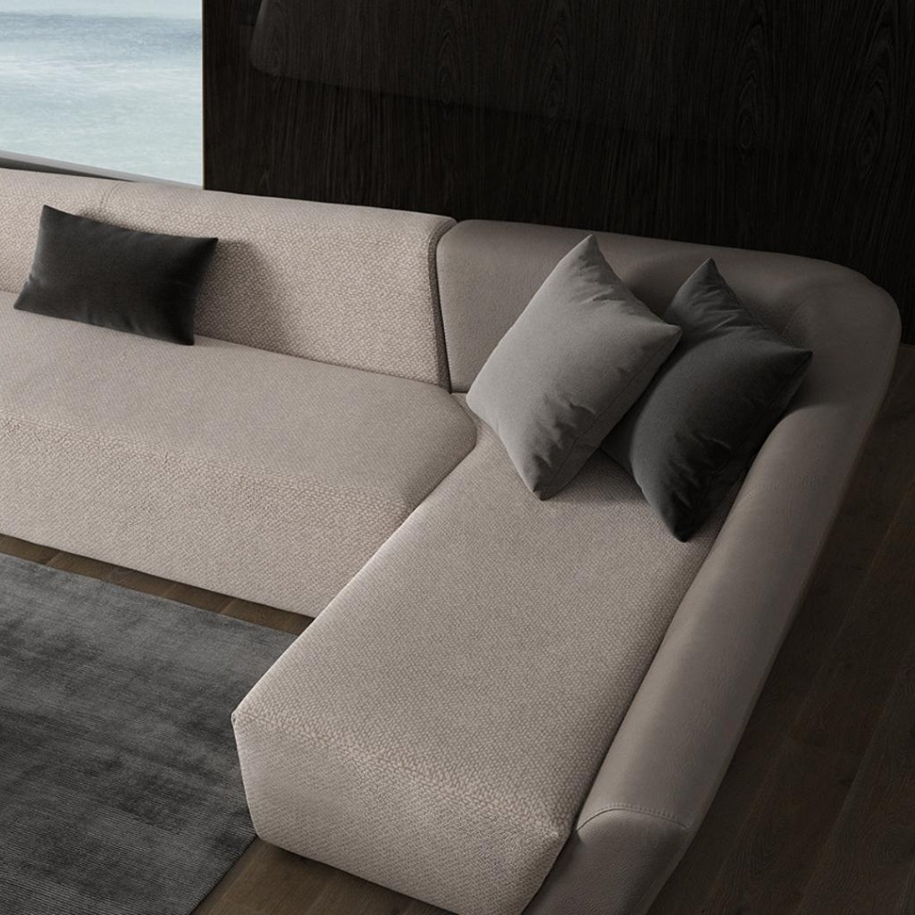 Edge Lounge Modular Sofa styled with decorative pillows for added comfort and elegance.