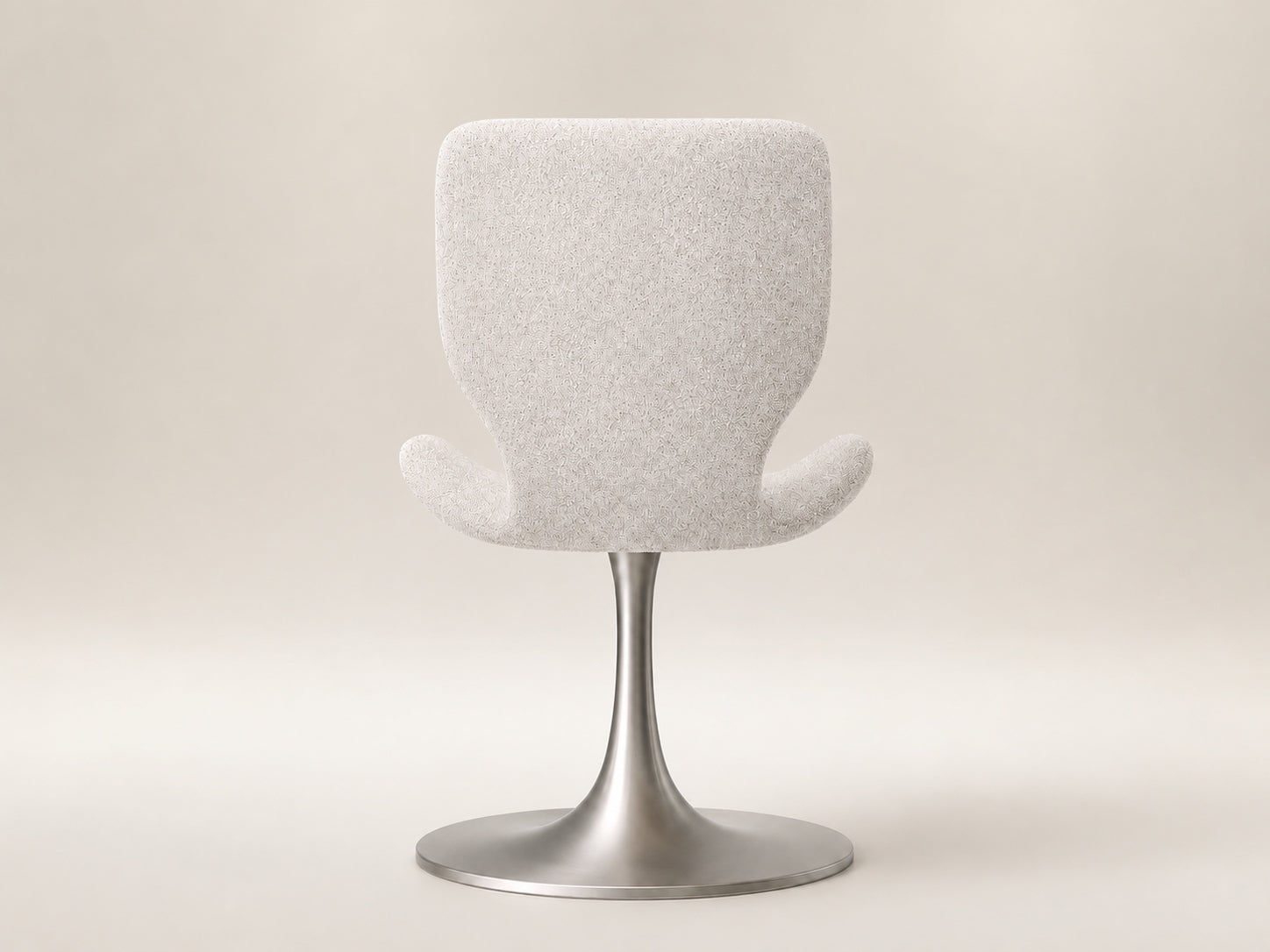 Elsa dining chair featuring an upholstered backrest, clean wooden frame and elegant proportions for modern dining spaces