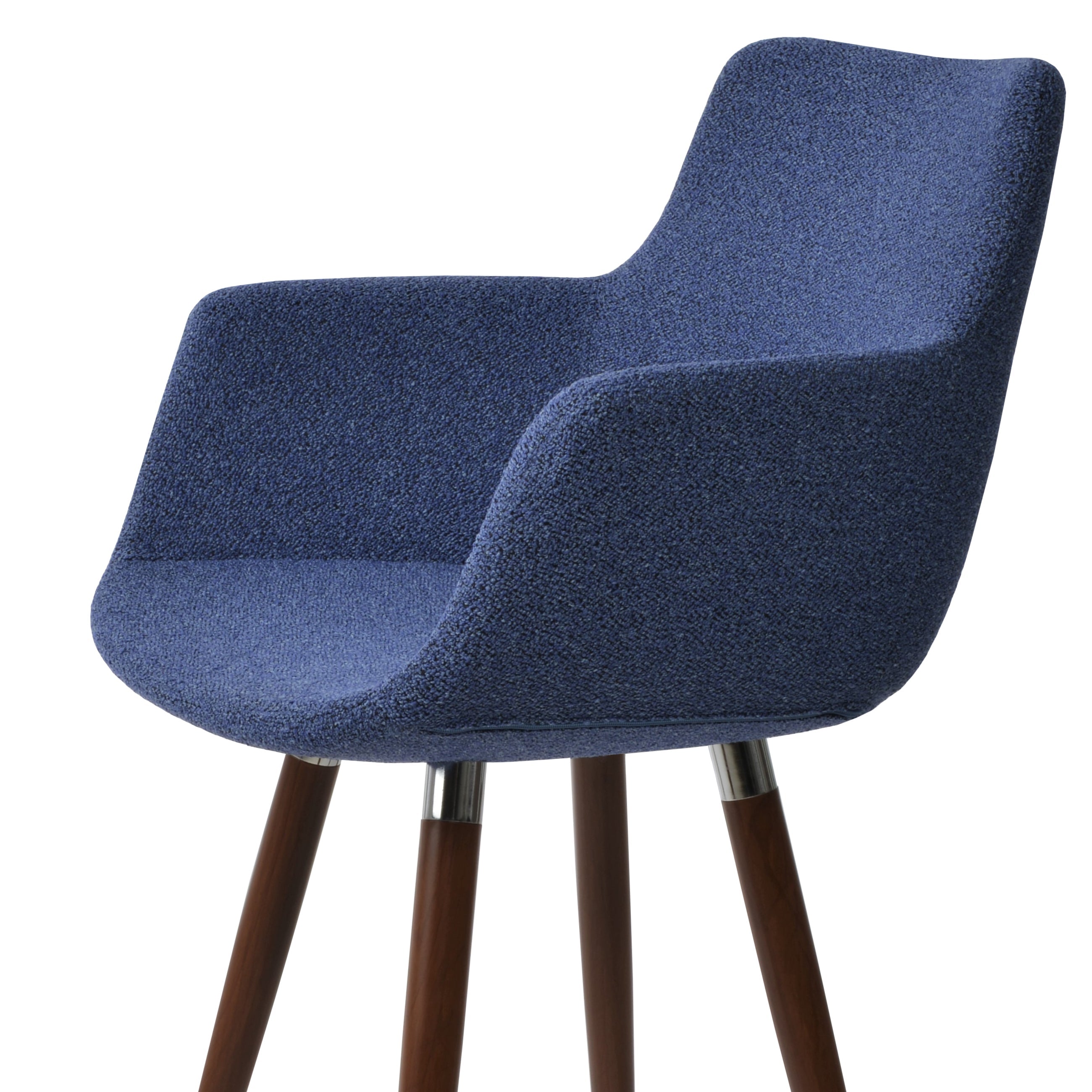 Blue upholstered stool with wooden legs on a white background