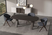 Koza Dining Chair styled in a complete dining room setup, enhancing the modern decor with its elegant design.