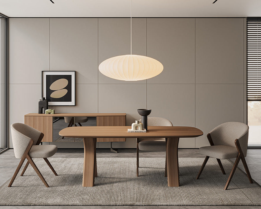 Koza Dining Table styled in a modern dining room setup, adding elegance and functionality.