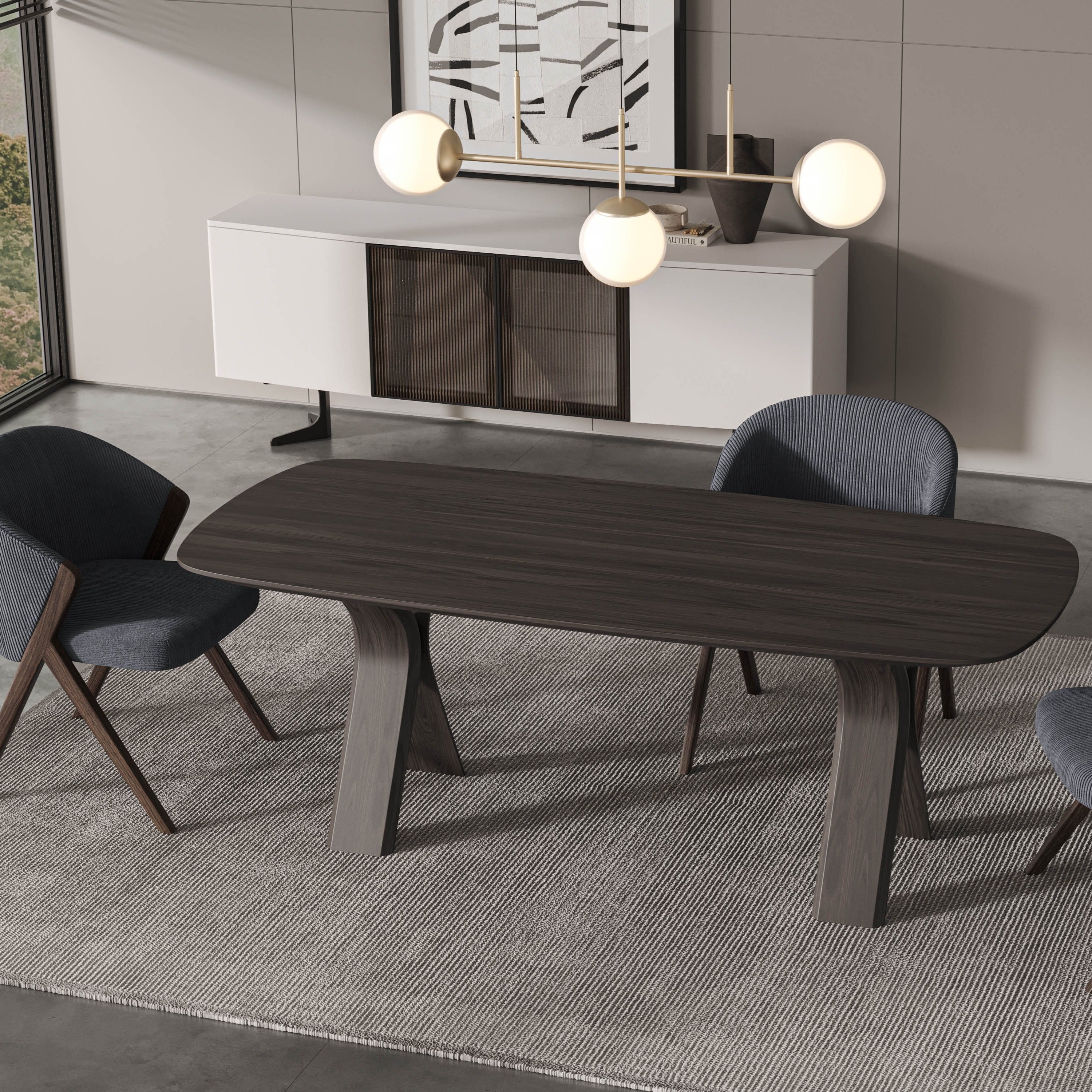 Koza Dining Table placed in natural light, showcasing its elegant and modern design.