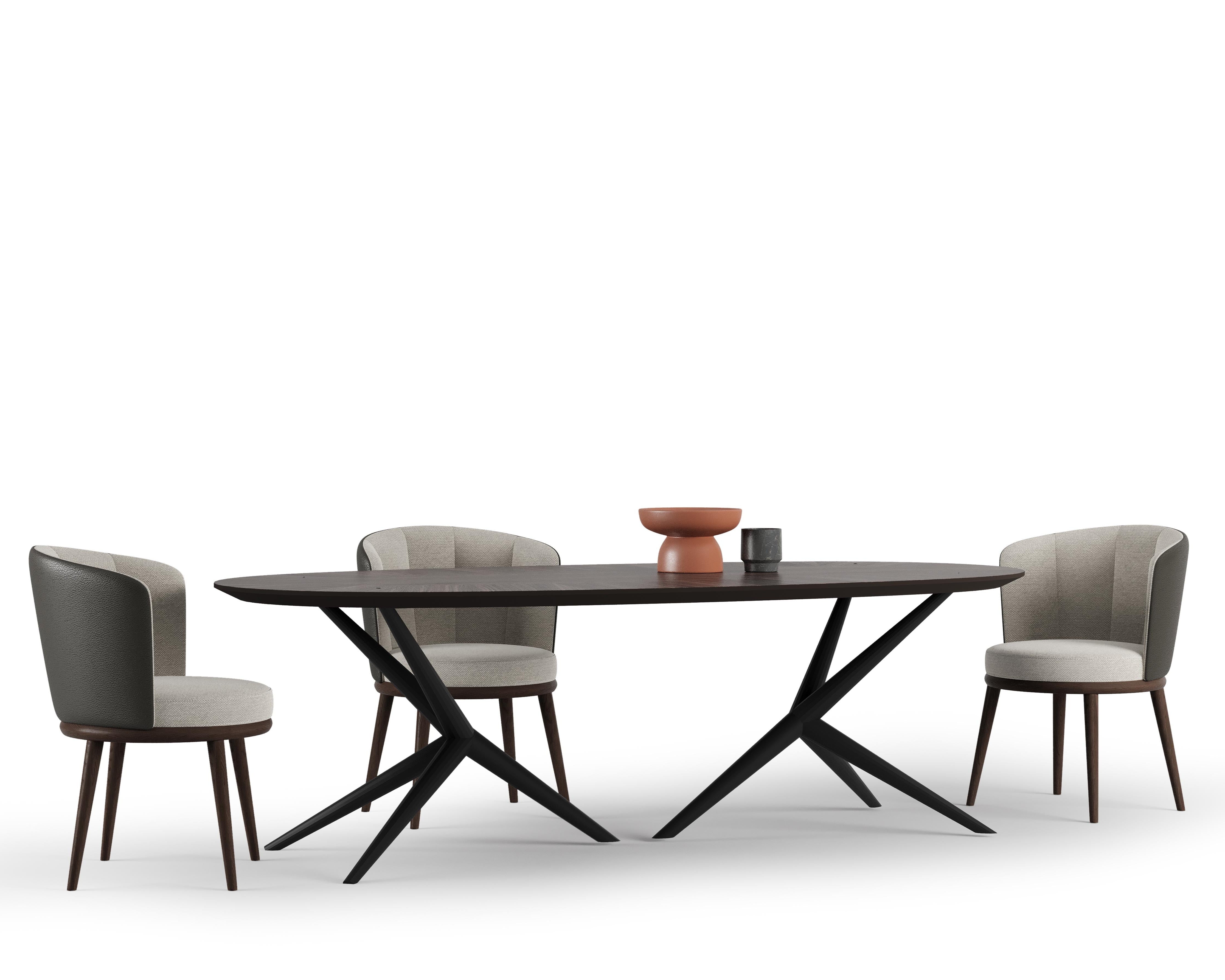 Side angle of the Lupa Dining Chair highlighting its comfortable seating and minimalist design.