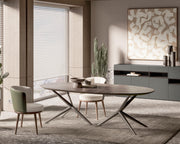 Side angle of the Lupa Dining Table highlighting its minimalist structure and elegant craftsmanship.
