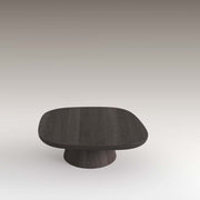 Moss Coffee Table with rounded top and solid base, showcasing organic curves in dark wood.
