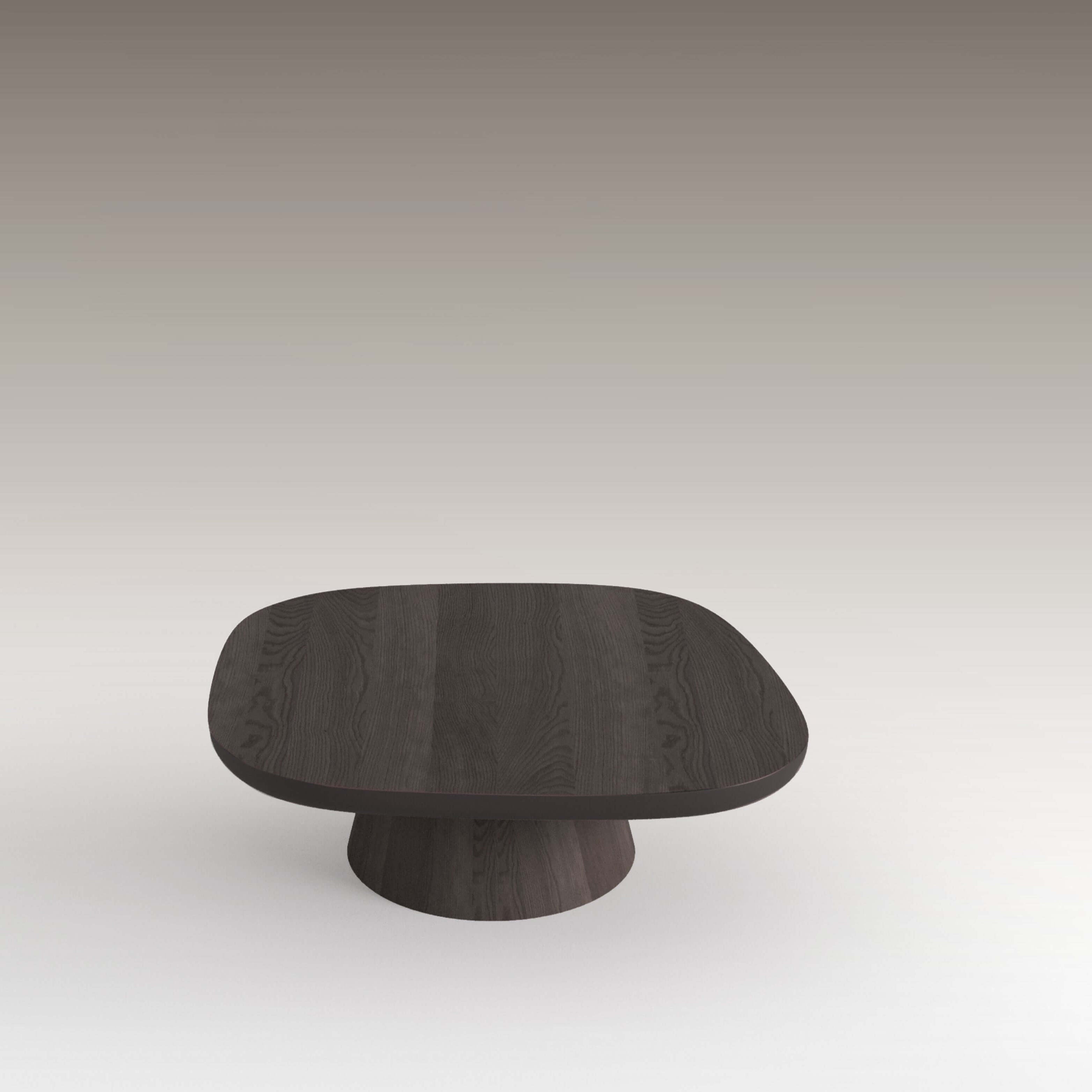 Moss Coffee Table with rounded top and solid base, showcasing organic curves in dark wood.