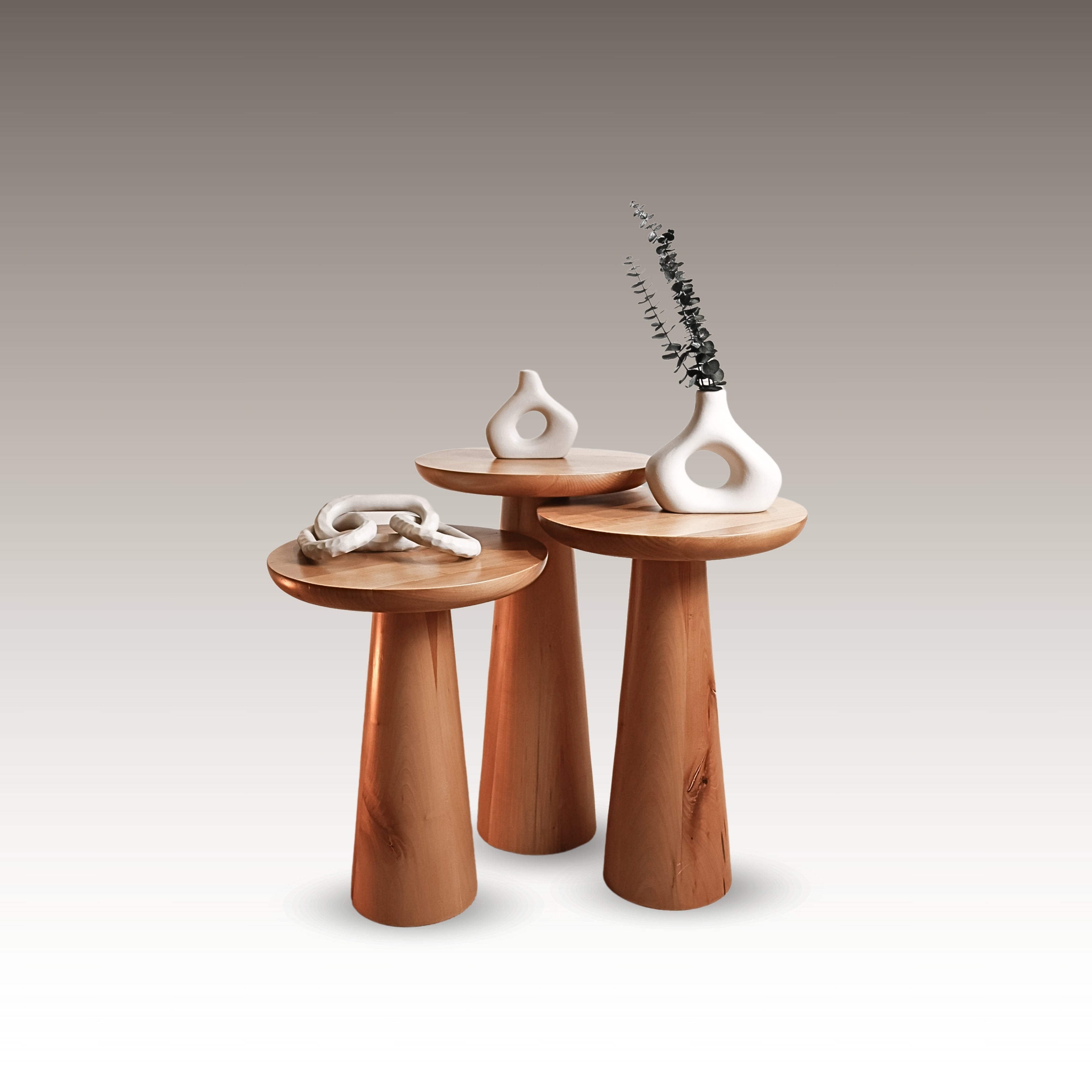 Trio of solid wood Mushroom Side Tables in different heights with rounded tops and sculptural bases