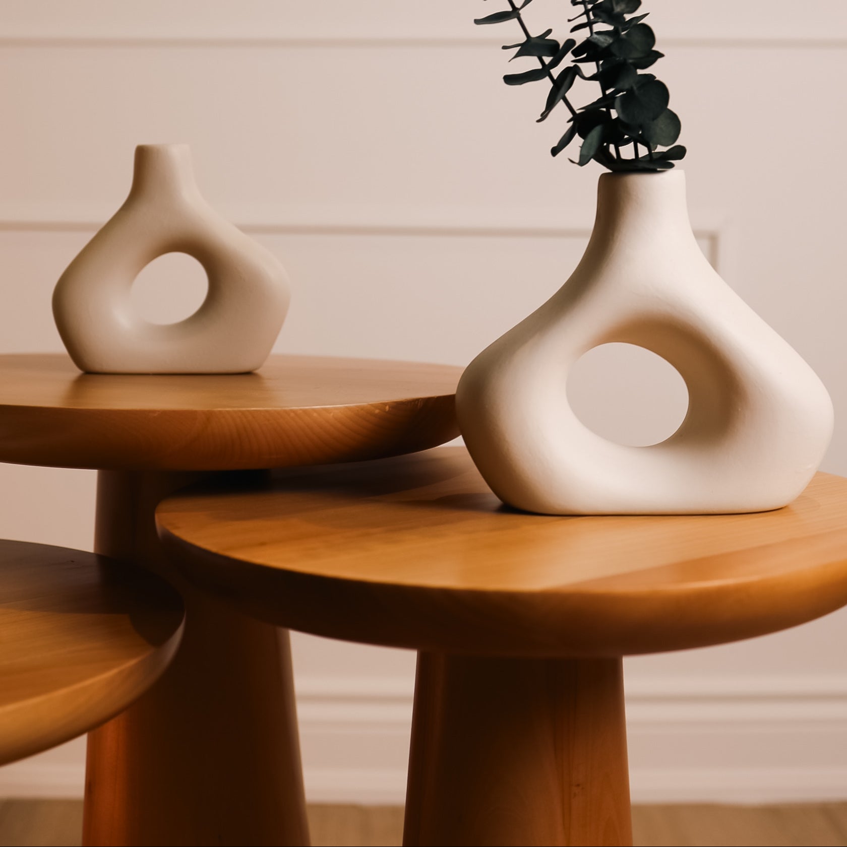 Side angle of the Mushroom Side Table highlighting its smooth curves and contemporary aesthetics.