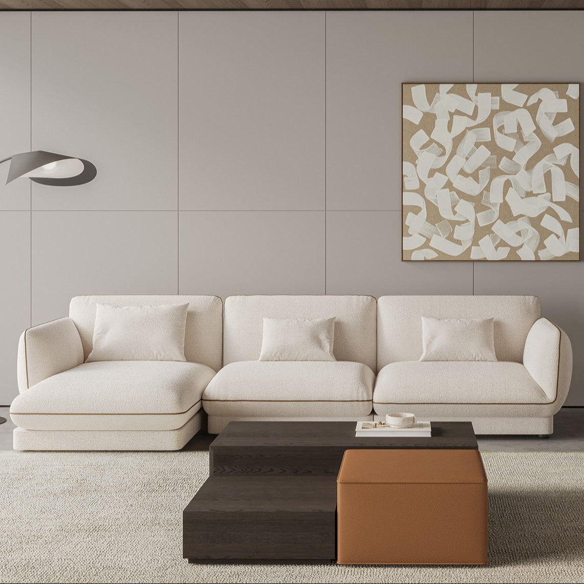 Front view of the Orbit Plus Modular Sofa, showcasing a modern, minimalist design with plush seating for comfortable living.