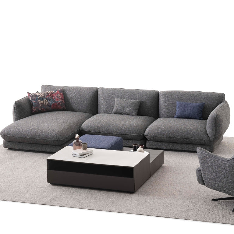 Orbit Plus Modular Sofa in a spacious family room, offering a cozy seating solution with a modern touch.