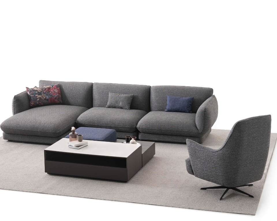 Orbit Plus Modular Sofa in a spacious family room, offering a cozy seating solution with a modern touch.