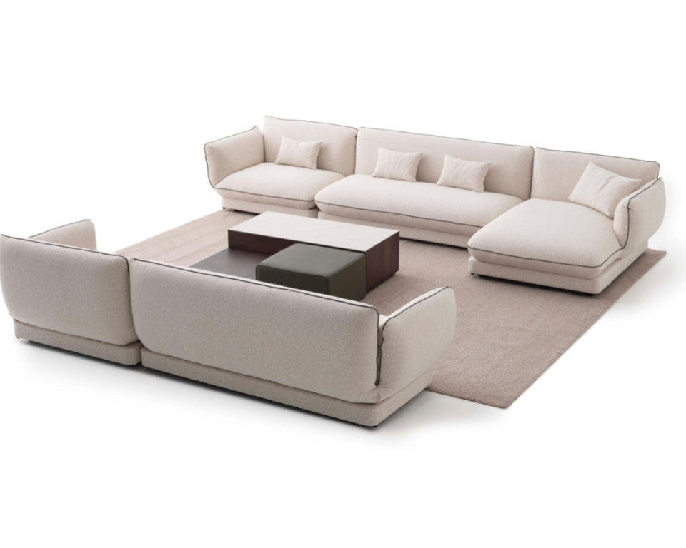 Close-up of the Orbit Plus Sofa’s premium textured upholstery, showcasing high-quality materials and comfort.