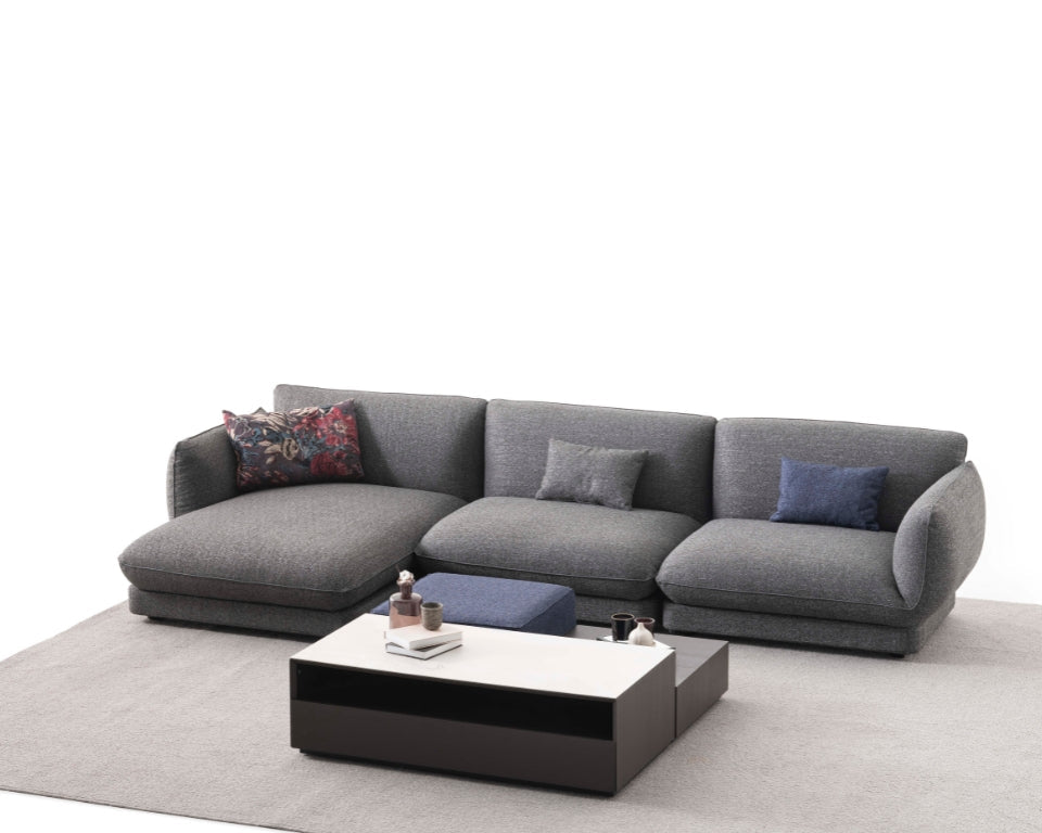 Orbit Plus Modular Sofa arranged in a unique configuration, demonstrating versatile layout options.
