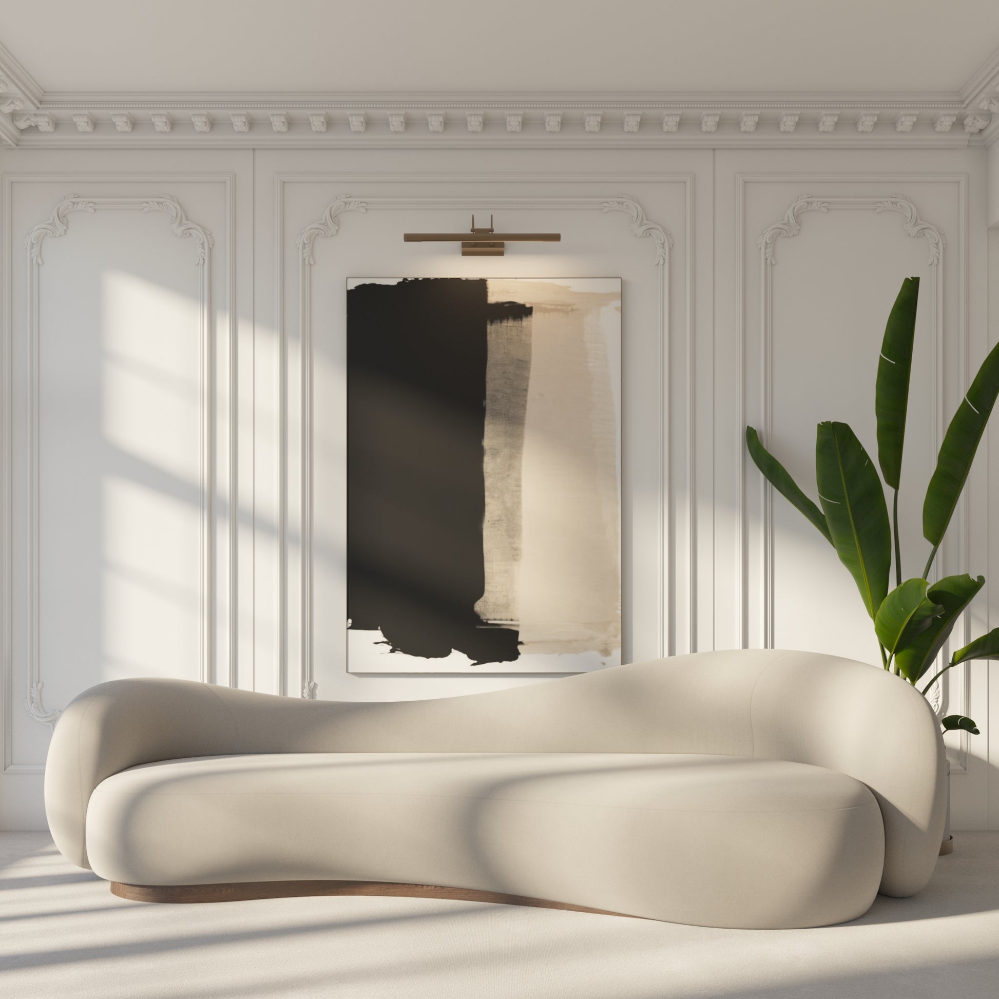 Modern beige sofa in a stylish room with abstract art and a plant