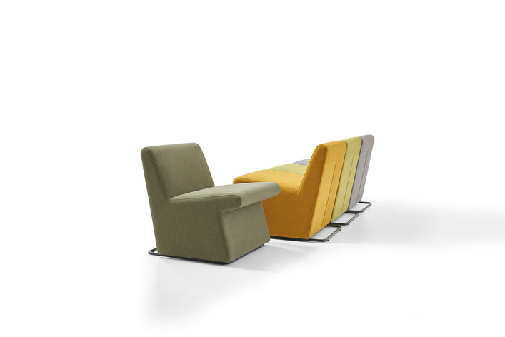 Modern armchair and bench on a white background