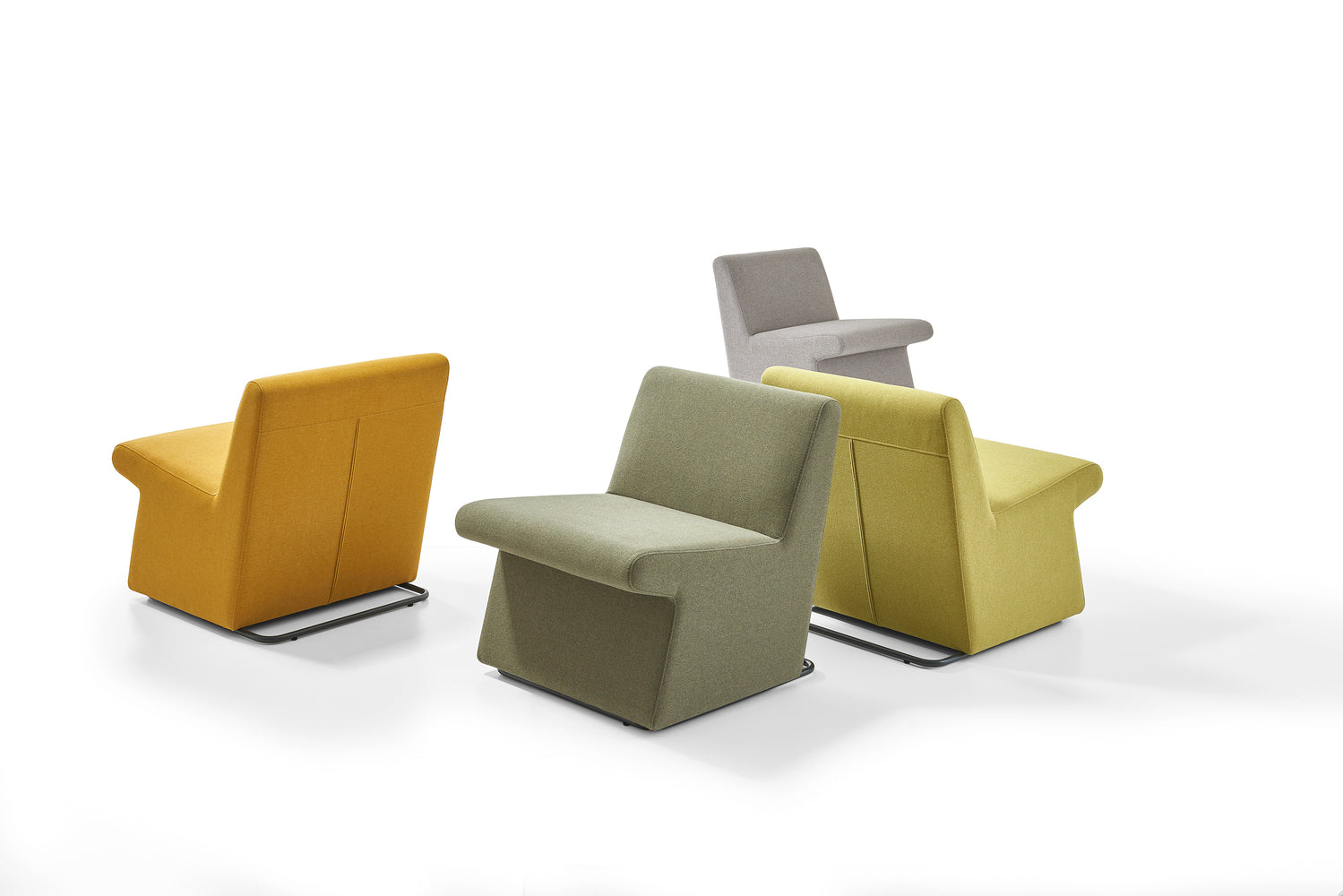 Four modern chairs in yellow, green, and gray on a white background