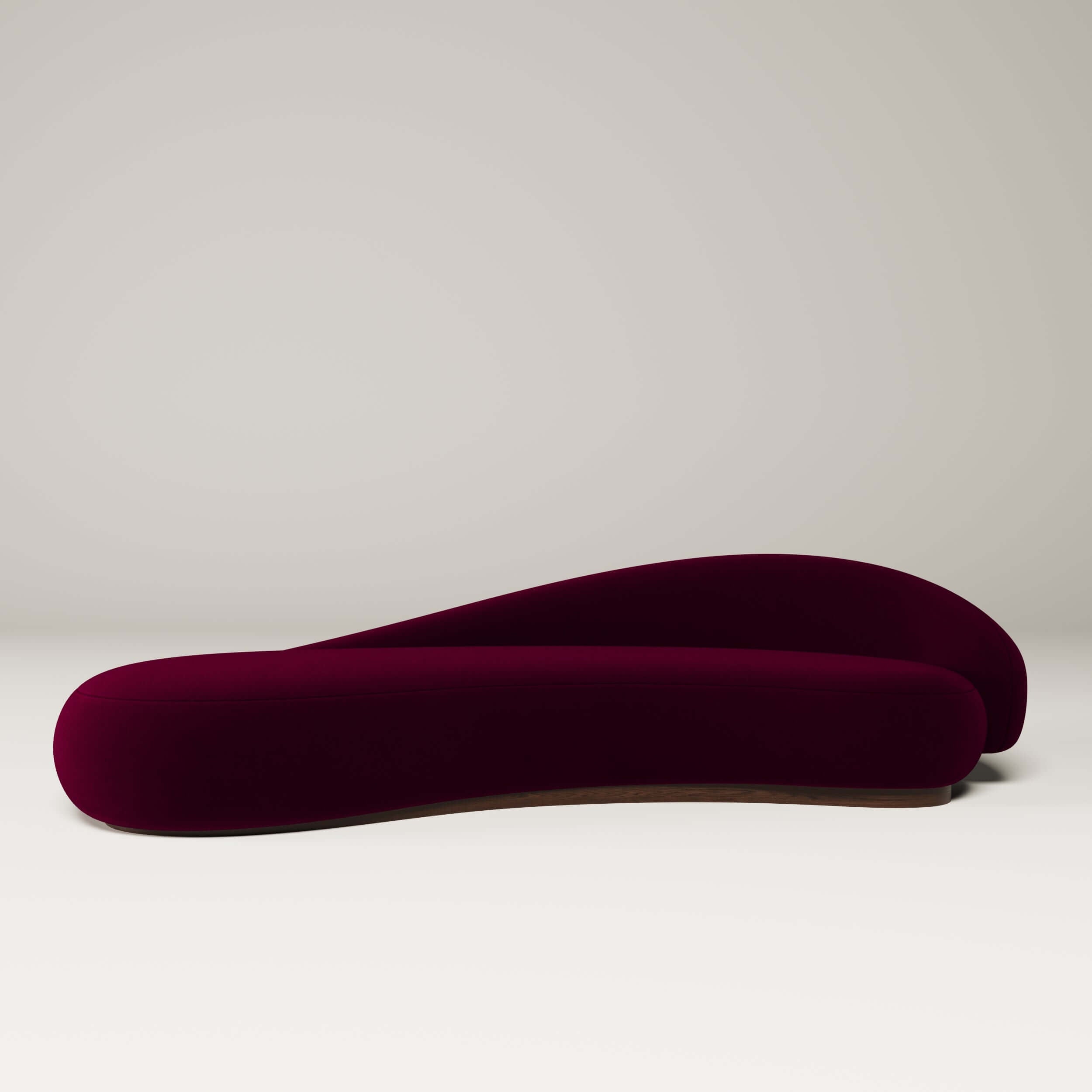 Papilio Curved Sofa, showcasing a modern sculptural design with gentle curves.