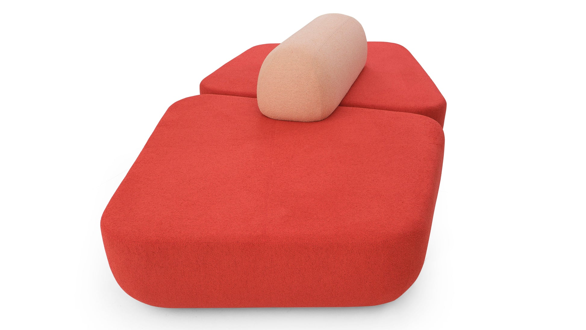 Red cushion with a beige ball on top on a white background