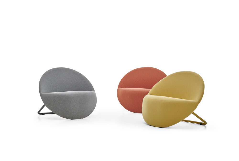 Three colorful chairs in gray, red, and green on a white background