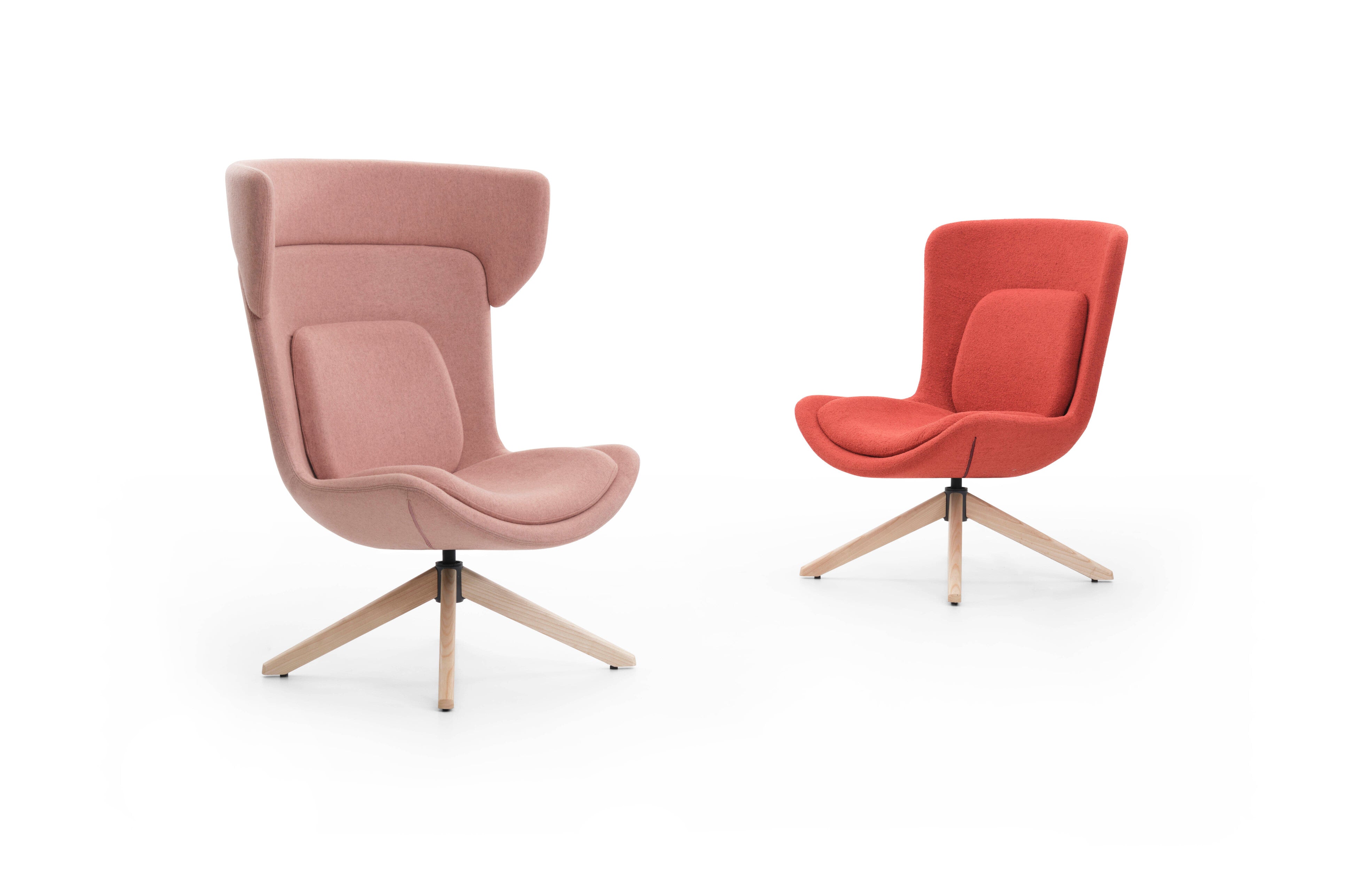 Two modern chairs, one pink and one red, on a white background