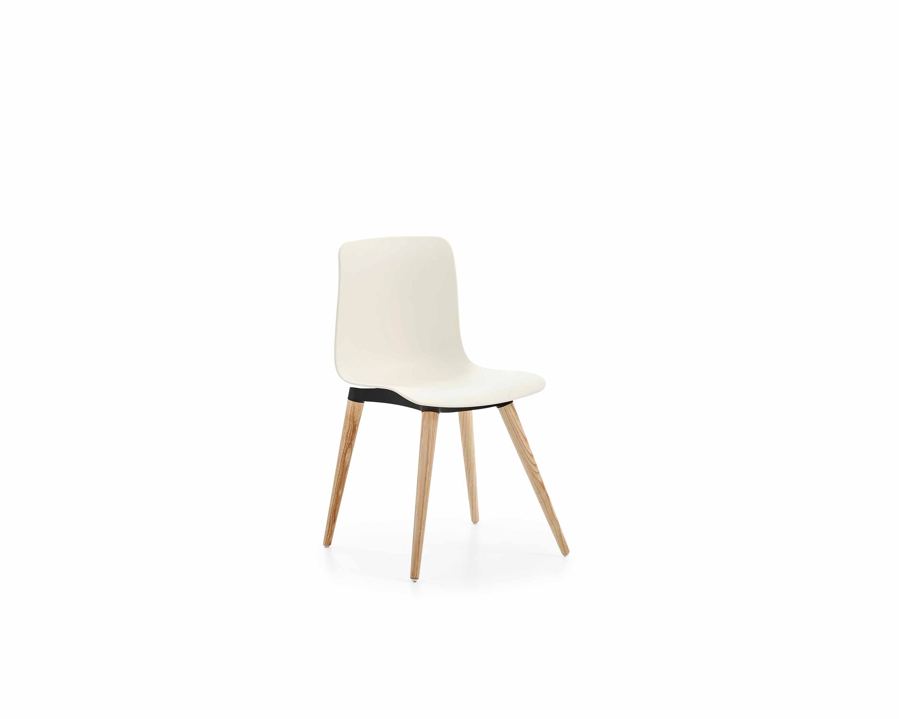 White chair with wooden legs on a white background