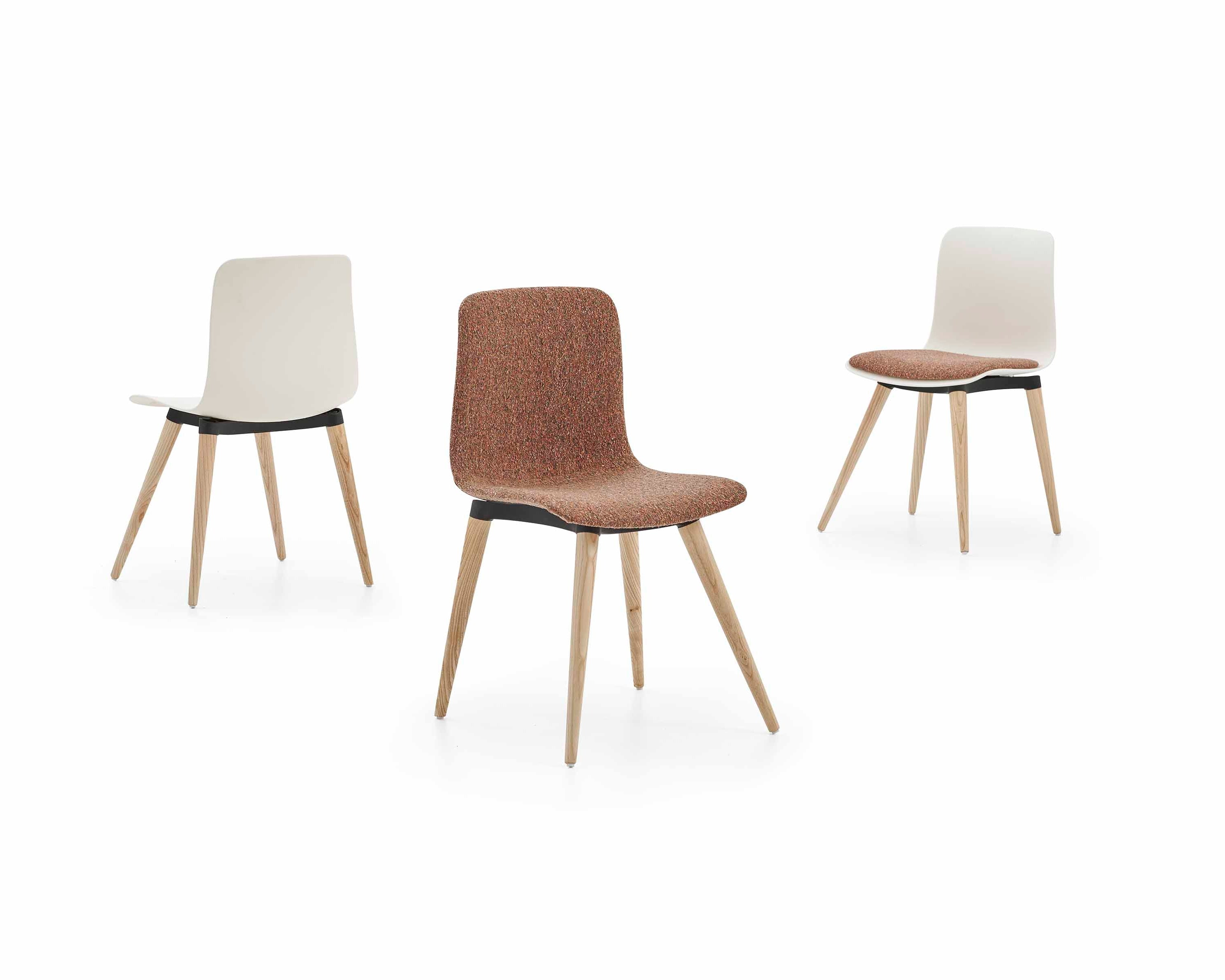 Three chairs with different seat and back designs on a white background