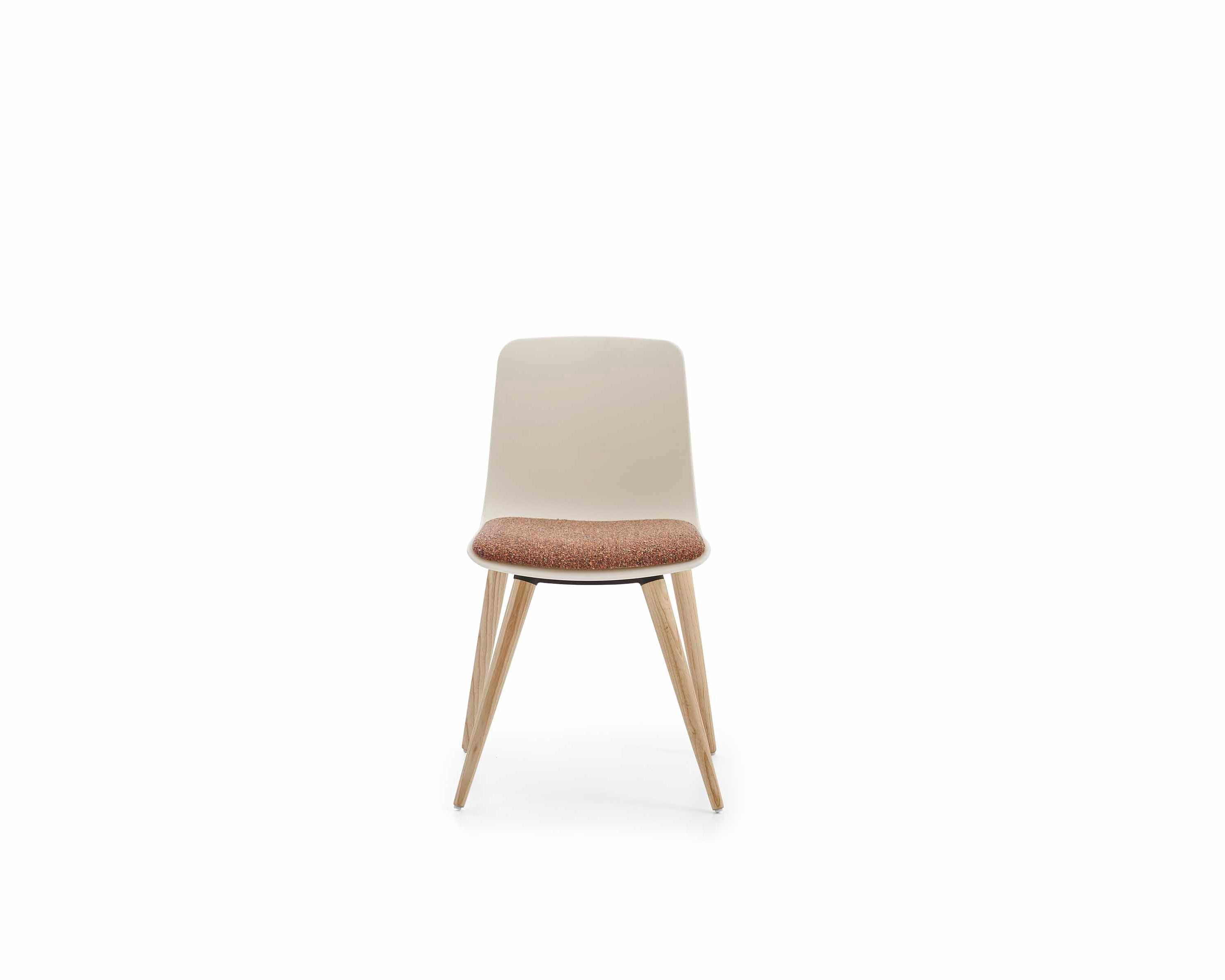 Chair with beige cushioned seat and wooden legs on a white background