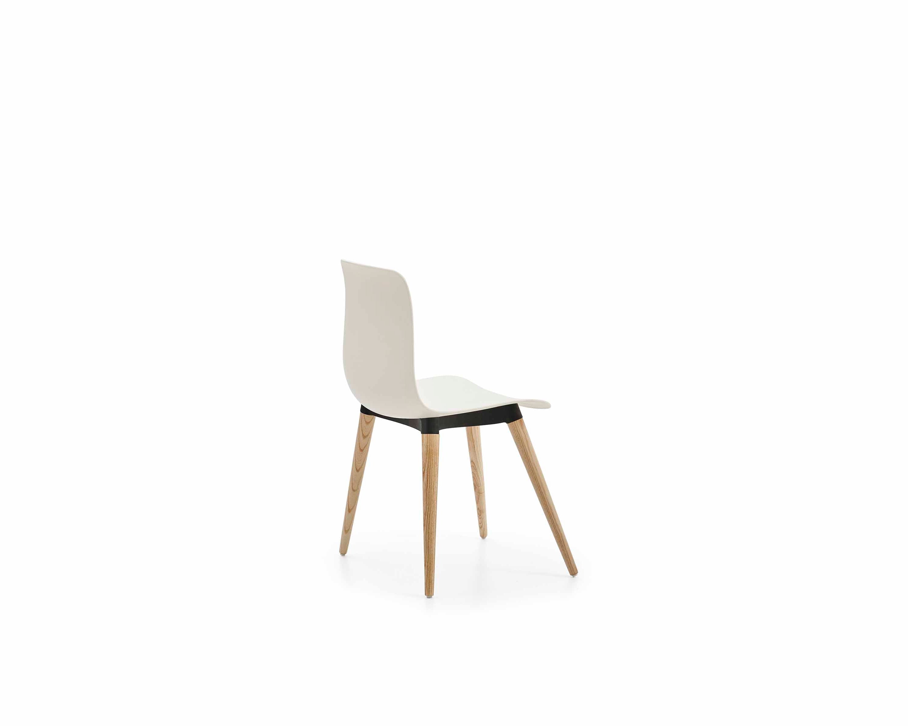 White chair with wooden legs on a white background