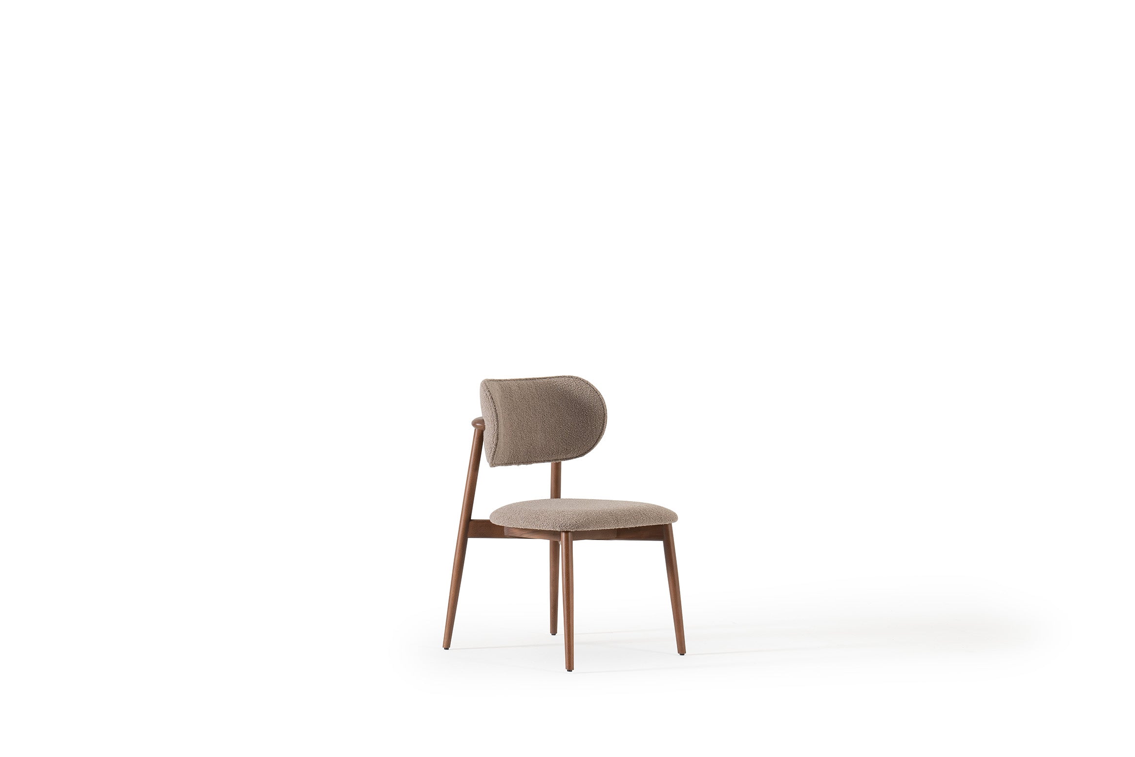 Vokka Dining Chair styled in a complete dining room setup, enhancing the space with its contemporary design.