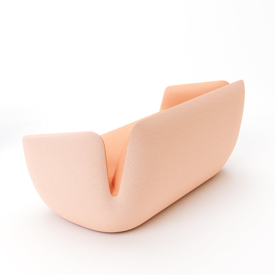 Two unique chairs, one blue and one peach-colored, on a white background