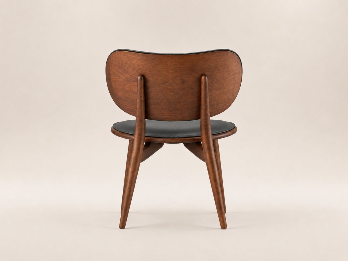 Aaron Dining Chair in grey upholstery with ash walnut finish, combining striking aesthetics and everyday durability