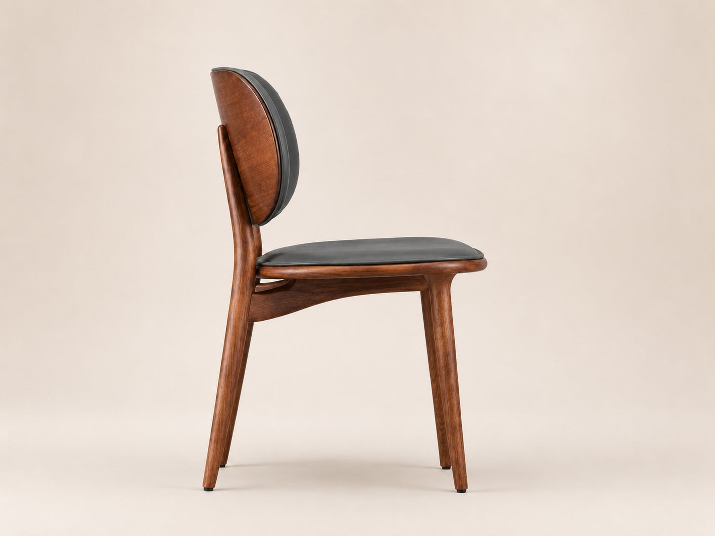Aaron modern dining chair with solid ash wood finish, supportive comfort and refined contemporary proportions