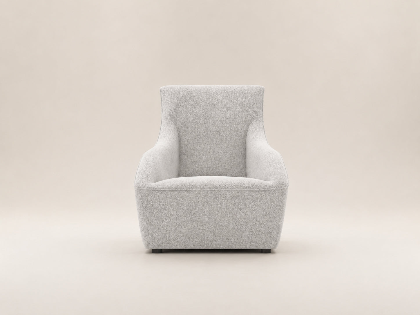 Amalfi Aura Armchair by Canapy Furniture featuring a sculptural wraparound back, sloped arms and modern luxury comfort