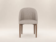 Andrea Dining Chair by Canapy Furniture featuring a gracefully curved backrest, plush upholstery and refined wood frame