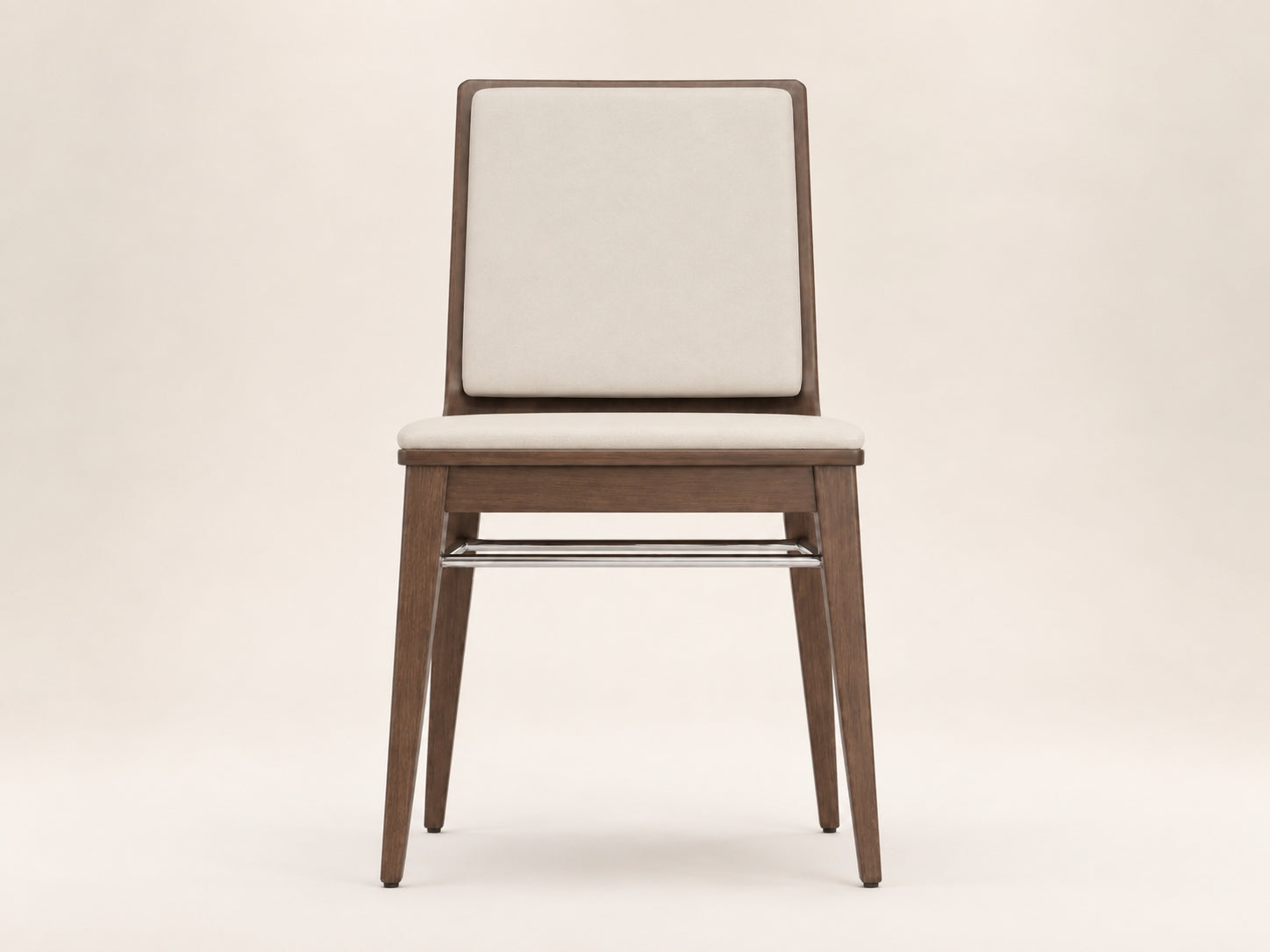 Arc Dining Chair by Canapy Furniture featuring an American walnut finish, upholstered seat and sculptural modern design