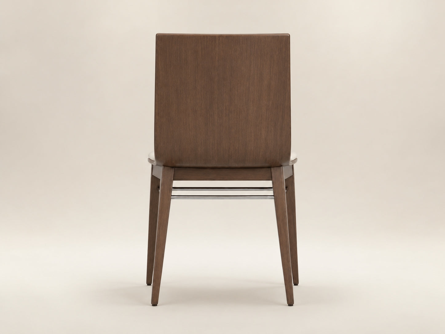 Arc modern walnut dining chair designed for dining rooms, kitchens and refined hospitality spaces